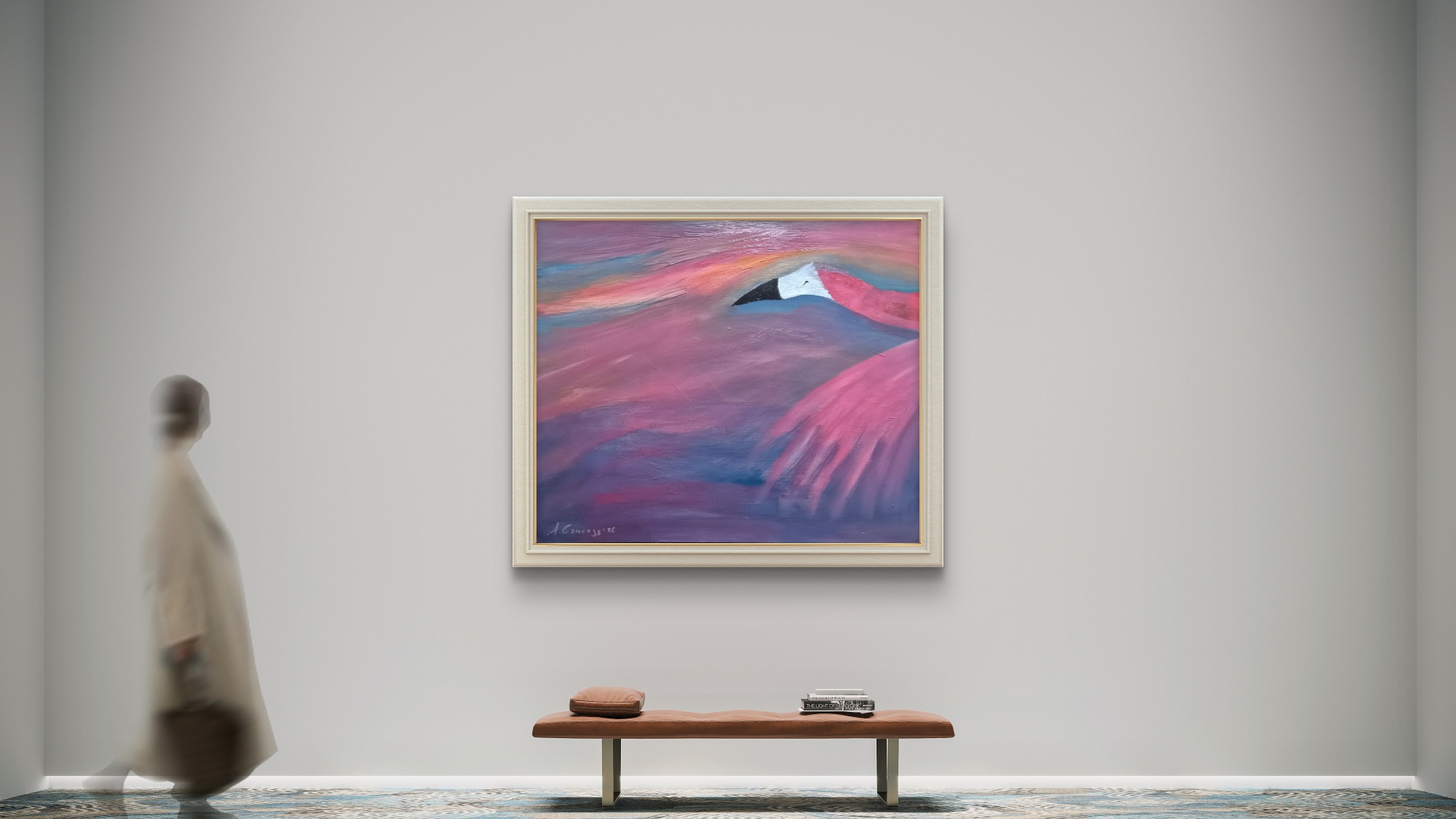 Pink and violet abstract landscape in a cream frame above a leather bench